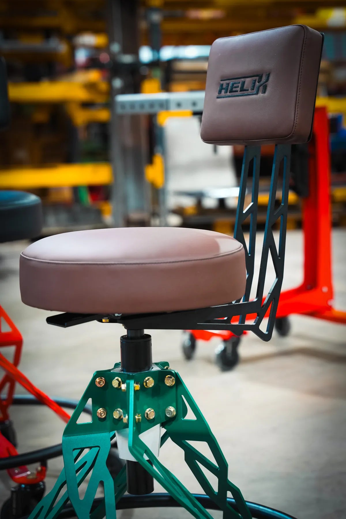 Green Helix Hi-Rider with brown leather seat