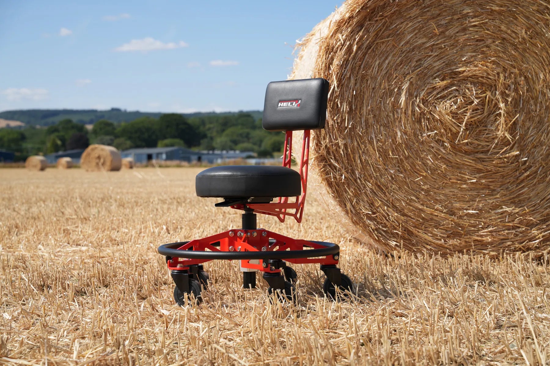 Red Helix Low-Rider by a hay bale