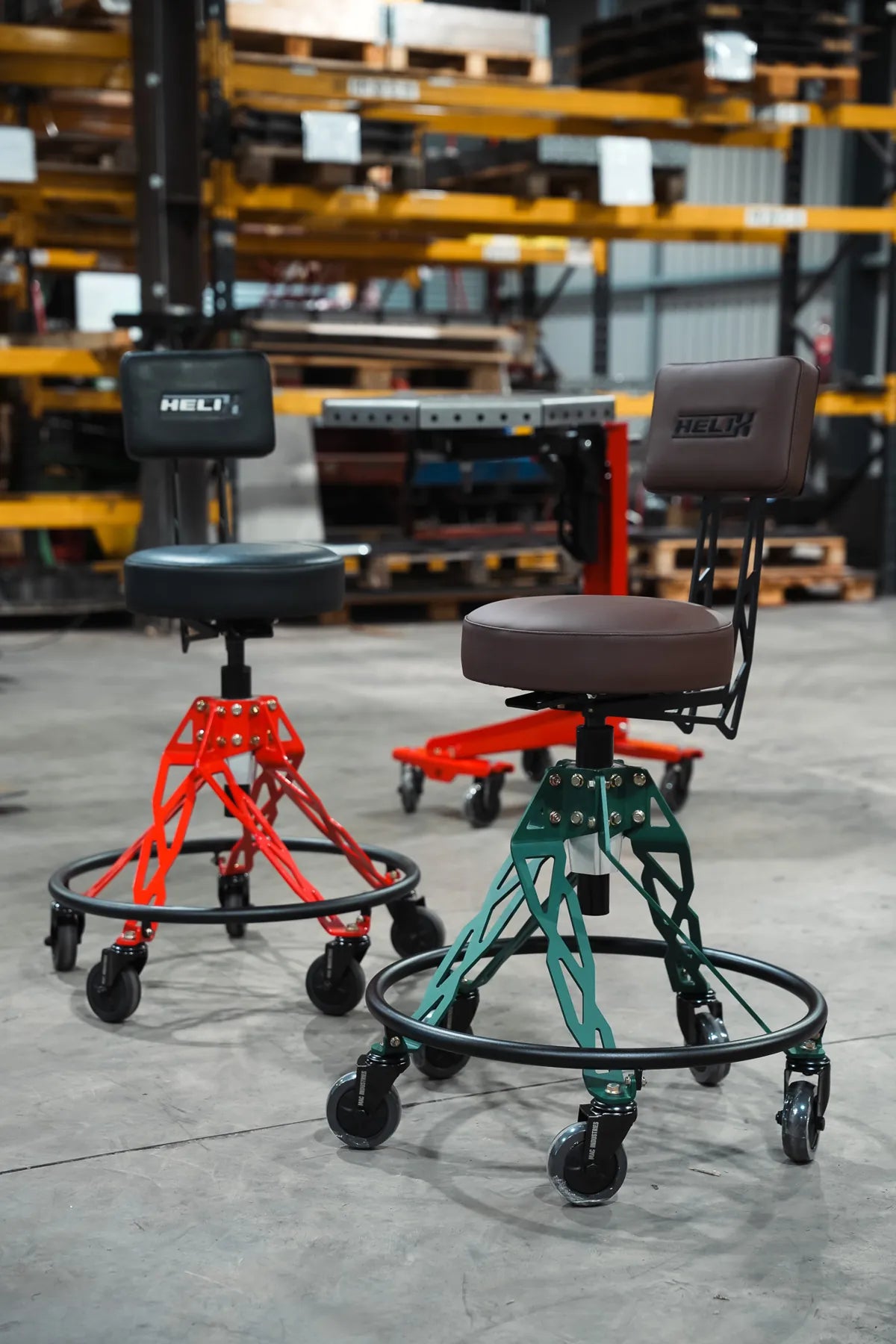 Red and green Helix Hi-Riders side by side in the workshop