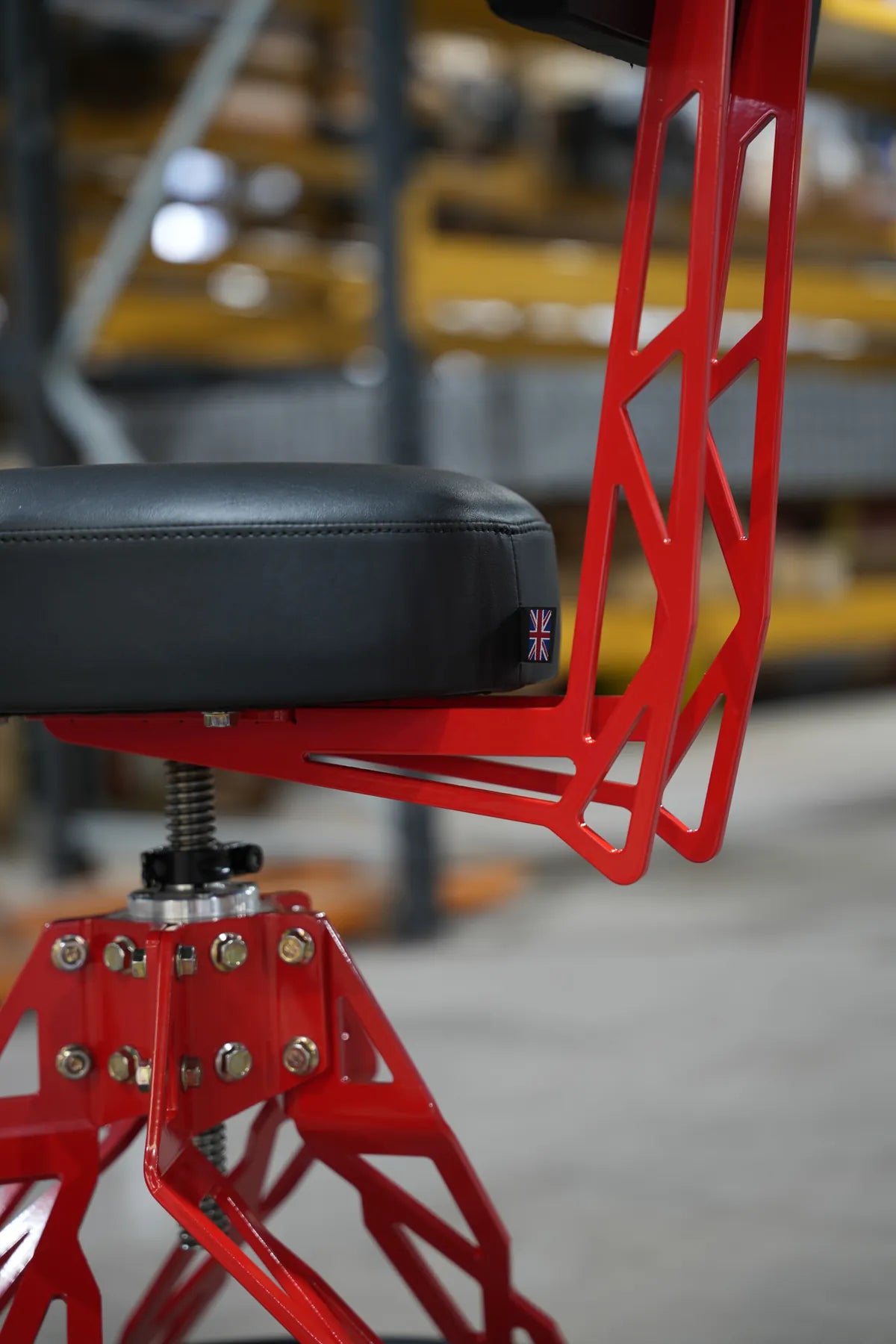 Threaded height adjuster and Union Jack tag on a red Helix